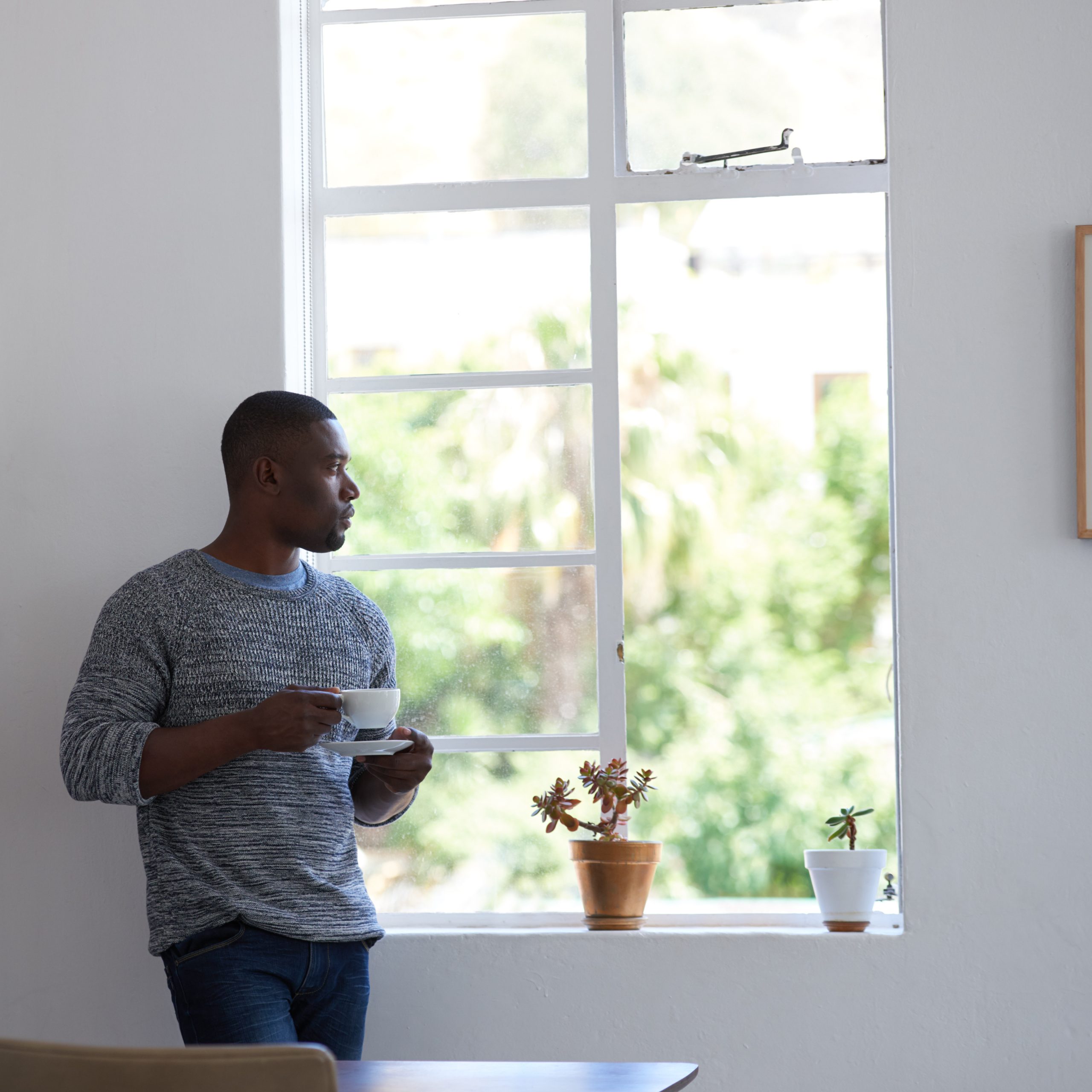 shot-of-a-young-businessman-having-a-coffee-break-2025-04-06-07-37-39-utc